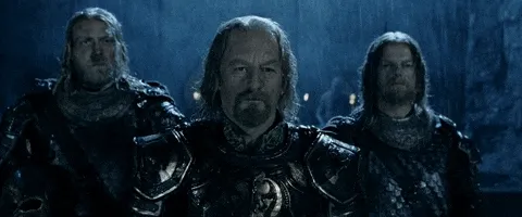 Théoden and two Rohirrim marching out into the rain